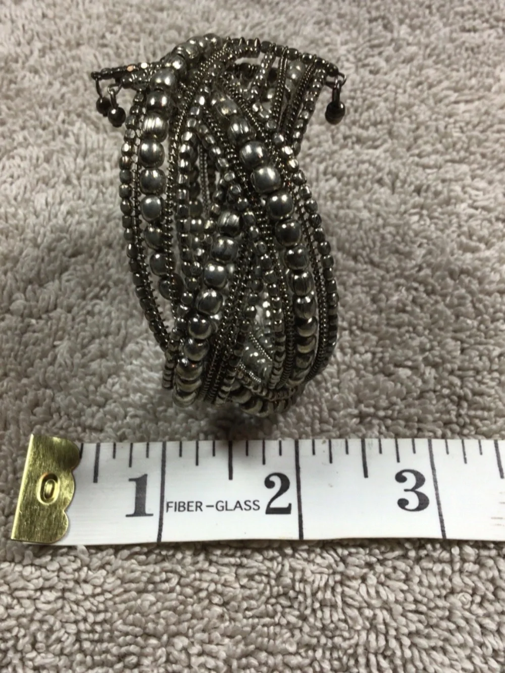 vintage-style metallic multi-strand bead cuff bracelet